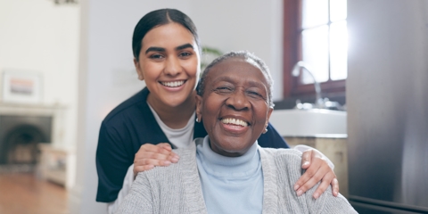 attendant with happy senior