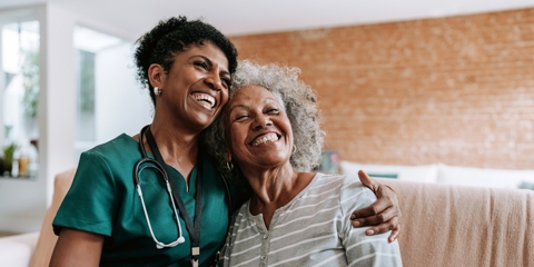 Caregiver and patient being happy